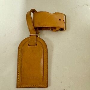 Louis Vuitton Luggage tag and Poignant
